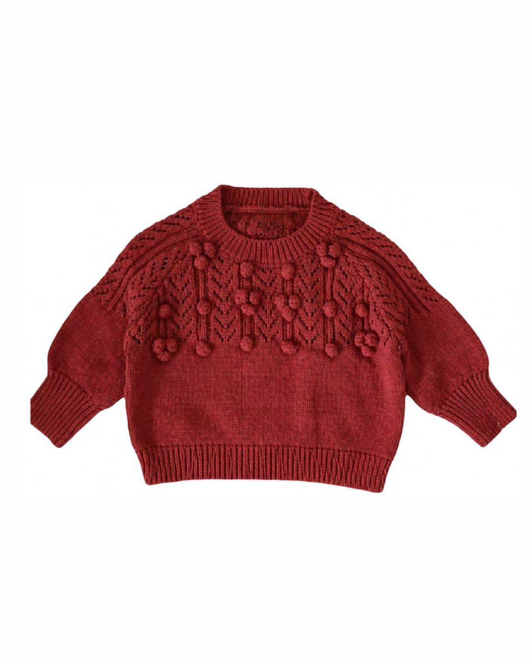 The red pom-pom knit sweater