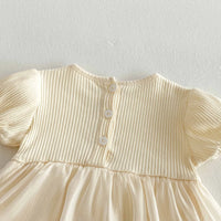 Oli dainty floral skirted romper
